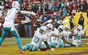 Miami Dolphins wide receiver Tyreek Hill (10) celebrates in the end zone