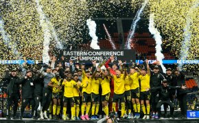 The Columbus Crew hoist the trophy after their 3-2 extra time win over FC Cincinnati