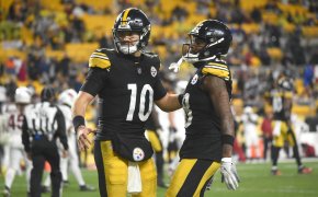 Pittsburgh Steelers quarterback Mitch Trubisky celebrates a touchdown with wide receiver Diontae Johnson