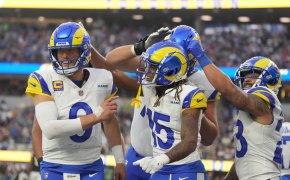 Los Angeles Rams wide receiver Demarcus Robinson (15) celebrates with quarterback Matthew Stafford (9) and running back Kyren Williams (23)