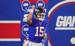 New York Giants quarterback Tommy DeVito (15) reacts before the game