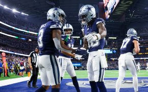 Dallas Cowboys wide receiver Brandin Cooks (3) celebrates with Dallas Cowboys wide receiver CeeDee Lamb (88) after making a touchdown catch