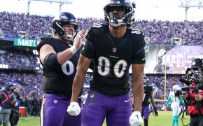 Baltimore Ravens tight end Isaiah Likely (80) greeted by center Tyler Linderbaum (64) following his second quarter touchdown