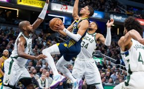 Indiana Pacers guard Tyrese Haliburton drives against several Milwaukee Bucks defenders