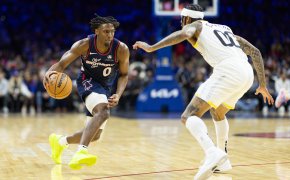 Philadelphia 76ers guard Tyrese Maxey dribbles against Utah Jazz guard Jordan Clarkson