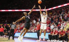 Iowa State Cyclones guard Tamin Lipsey shoots over Houston Cougars guard LJ Cryer