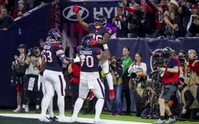 Houston Texans running back Devin Singletary (26) celebrates scoring a touchdown