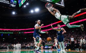 Boston Celtics forward Jayson Tatum dunks against the Denver Nuggets