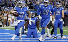 Detroit Lions' Craig Reynolds runs into the end zone for a 1-yard touchdown