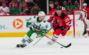 Carolina Hurricanes center Sebastian Aho skates with the puck against New Jersey Devils right wing Timo Meier