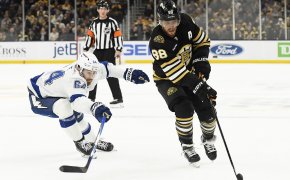Boston Bruins right wing David Pastrnak controls the puck against Tampa Bay Lightning