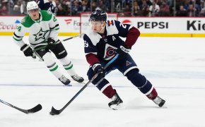 Colorado Avalanche center Nathan MacKinnon controls the puck in the second period against the Dallas Stars at Ball Arena
