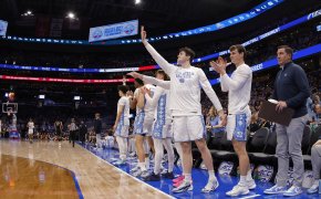 UNC's bench celebrating a three-point field goal