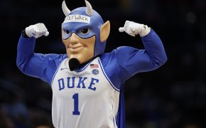 Duke Blue Devils mascot flexing at college basketball game