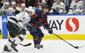 Edmonton Oilers forward Connor McDavid (97) looks to make a pass in front of Los Angeles Kings defensemen Drew Doughty (8) during the first period at Rogers Place.