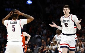 Connecticut Huskies center Donovan Clingan shrugs after scoring a basket