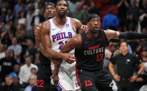Miami Heat forward Jimmy Butler boxes out Philadelphia 76ers center Joel Embiid
