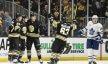 Boston Bruins left wing Jake DeBrusk celebrates his goal with his teammates against Leafs