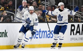 Toronto Maple Leafs center Auston Matthews reacts with left wing Tyler Bertuzzi after scoring a goal against the Boston Bruins