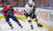 Edmonton Oilers forward Ryan Nugent-Hopkins and Los Angeles Kings defensemen Drew Doughty battle for a loose puck