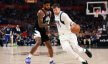 Dallas Mavericks guard Luka Doncic dribbles the ball against Los Angeles Clippers forward Paul George