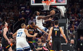 Minnesota Timberwolves guard Anthony Edwards goes for a layup against the Phoenix Suns