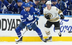 Toronto Maple Leafs right wing William Nylander skates with the puck against Boston Bruins