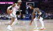 Oklahoma City Thunder guard Shai Gilgeous-Alexander looks to dribble around Dallas Mavericks guard Kyrie Irving