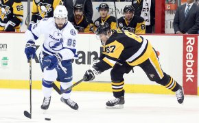 Tampa Bay Lightning right wing Nikita Kucherov chases the puck against Pittsburgh Penguins center Sidney Crosby