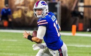 Josh Allen rolling out to pass