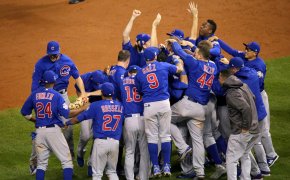 Chicago Cubs players celebrating on the mound