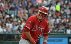 Mike Trout at the plate laughing