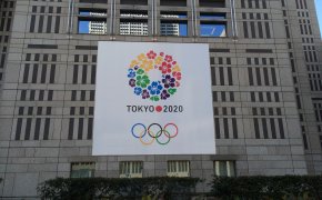 Olympic flag flying in Tokyo.