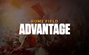 home field advantage text overlay on baseball crowd image