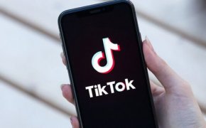 The TikTok logo on a cell phone.