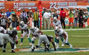 Miami Dolphins playing the Oakland Raiders.