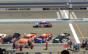Kyle Busch and others racing.