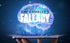 the gambler's fallacy text overlay on brain graphic from a cellphone