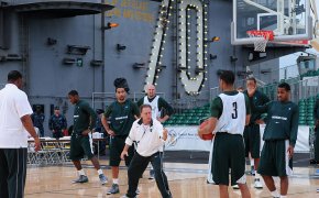 Tom Izzo coaching Michigan State on an aircraft carrier.